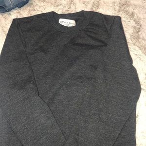 Grey tight crew neck .
